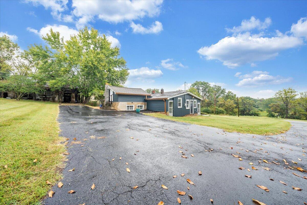 4515 Yellow Mountain Road Roanoke, VA 24014 - Photo 40 of 52 a view of a house with pool and a yard