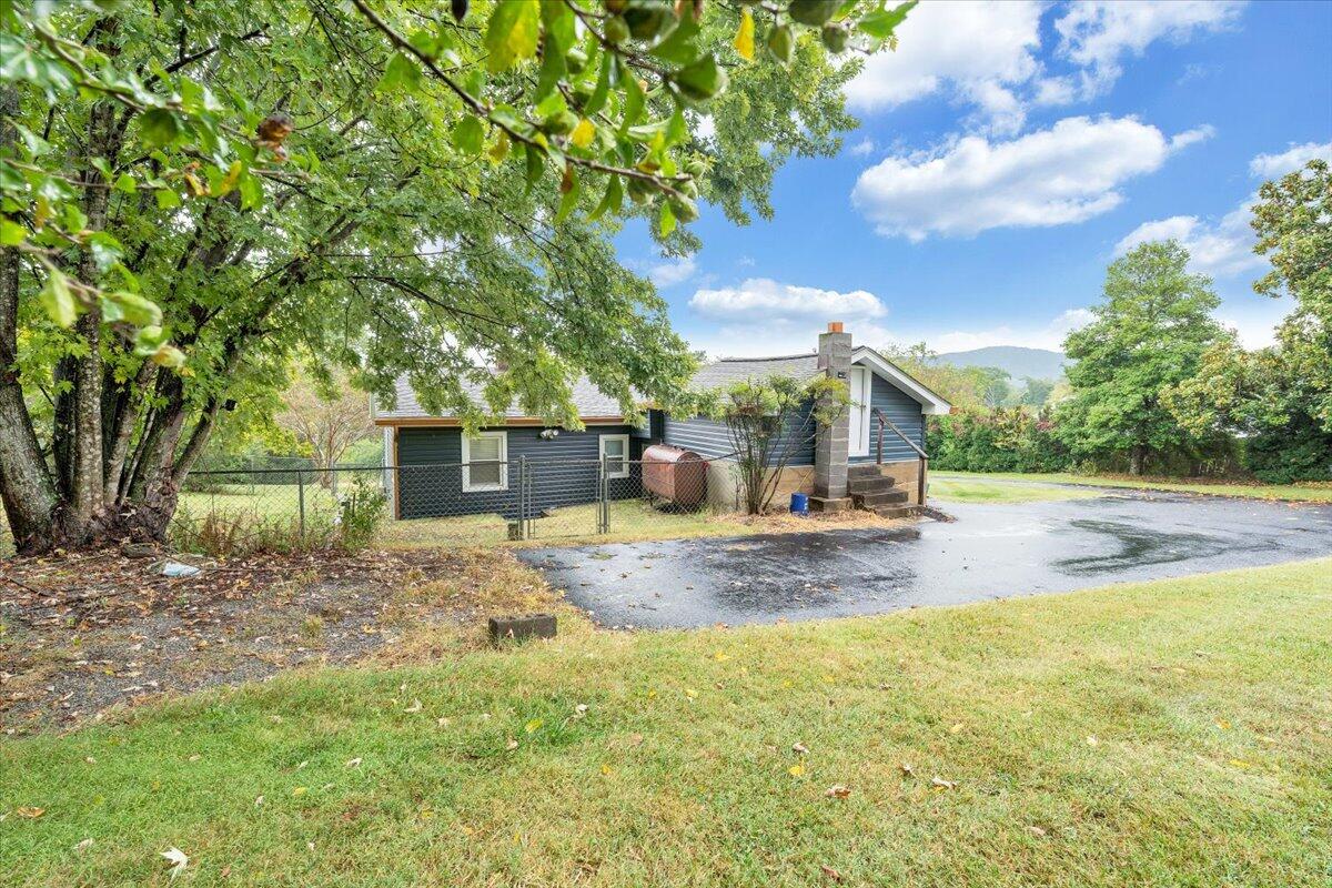 4515 Yellow Mountain Road Roanoke, VA 24014 - Photo 44 of 52 a view of a house with pool and a yard