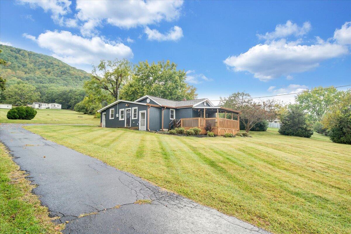 4515 Yellow Mountain Road Roanoke, VA 24014 - Photo 46 of 52 a swimming pool with trees in the background