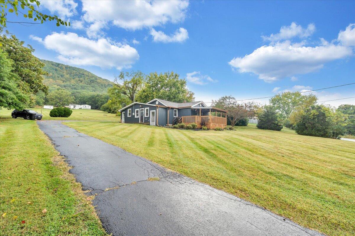 4515 Yellow Mountain Road Roanoke, VA 24014 - Photo 48 of 52 a view of swimming pool with large trees and a big yard