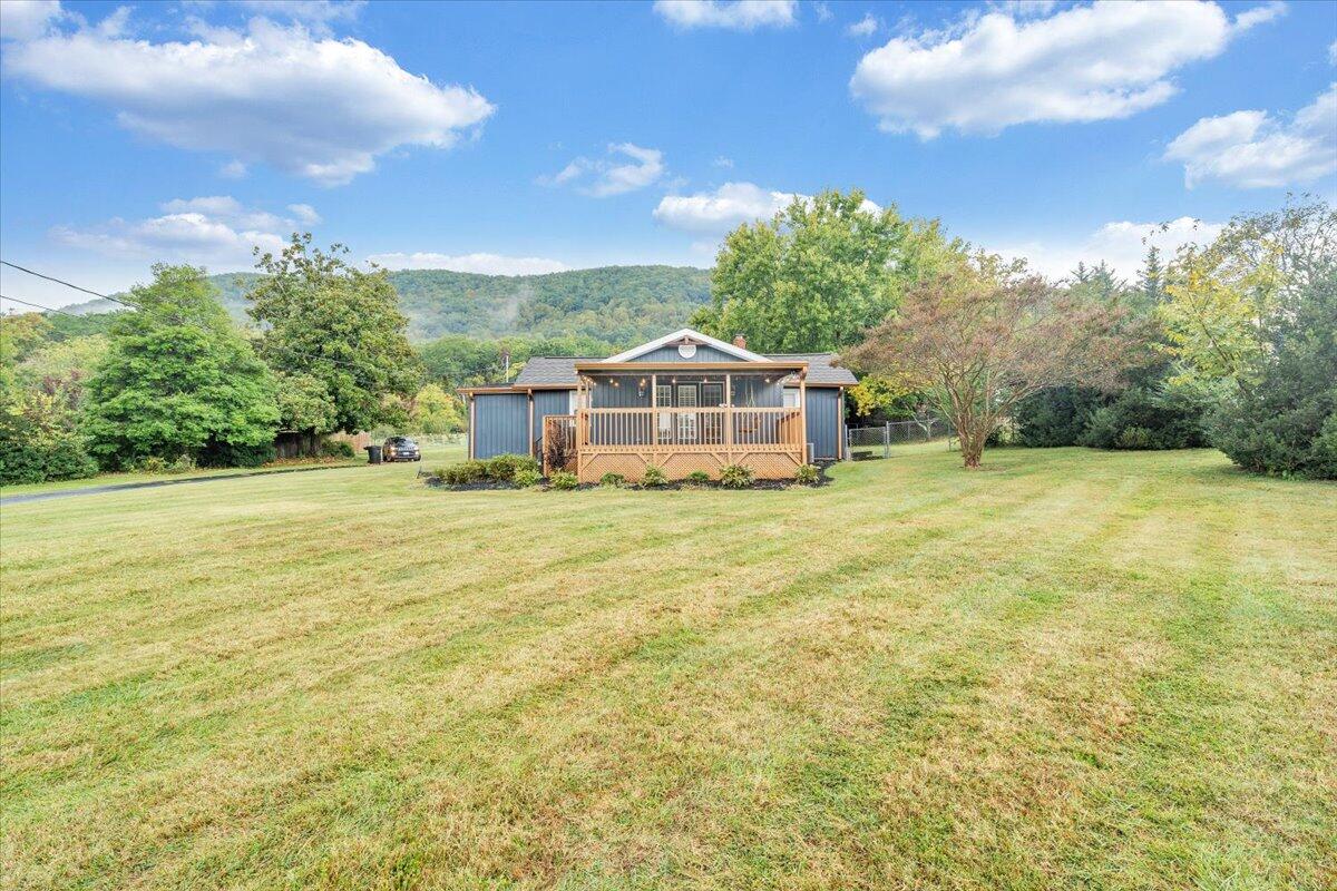 4515 Yellow Mountain Road Roanoke, VA 24014 - Photo 50 of 52 a front view of a house with a big yard