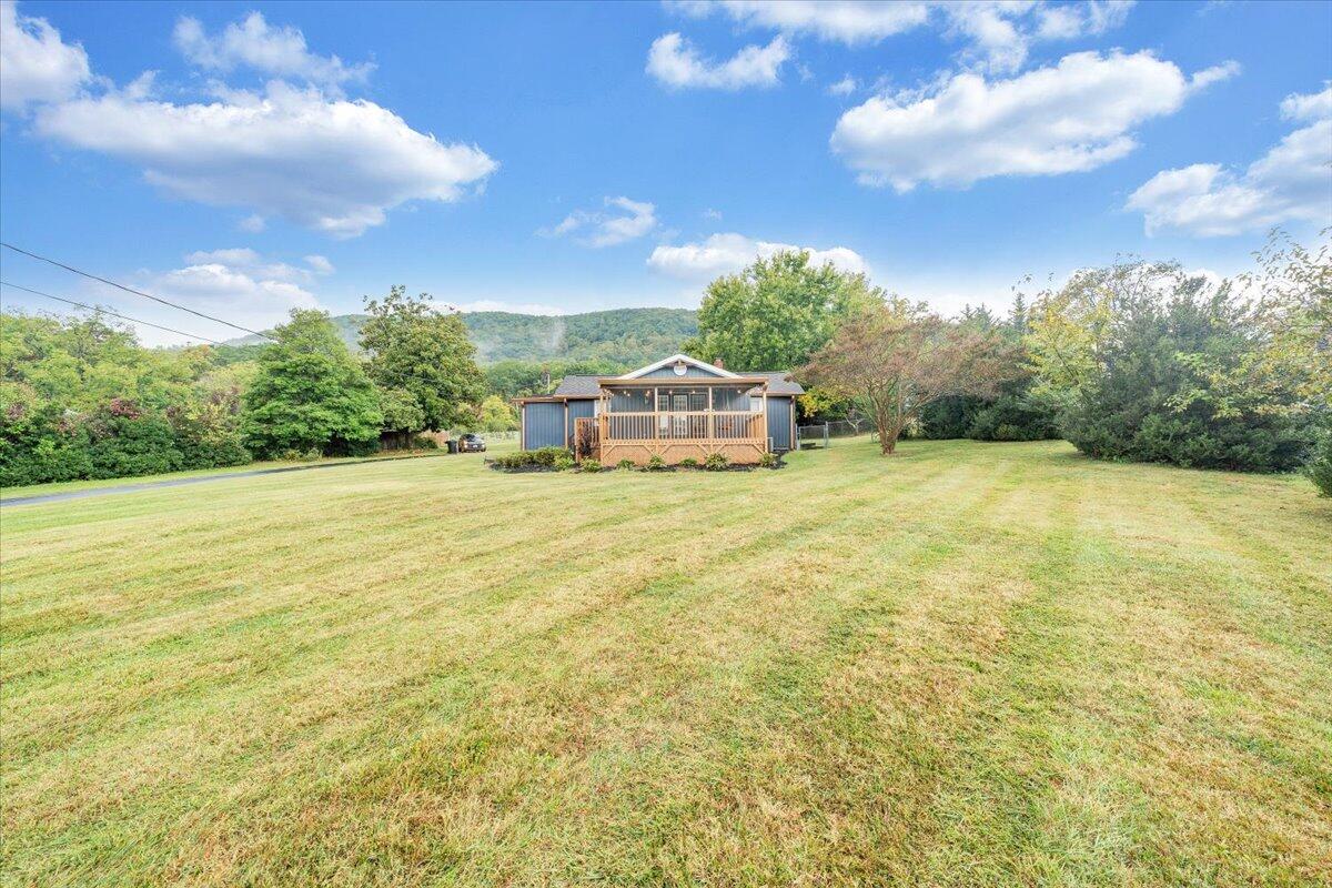 4515 Yellow Mountain Road Roanoke, VA 24014 - Photo 51 of 52 a view of a swimming pool with an outdoor space and seating area