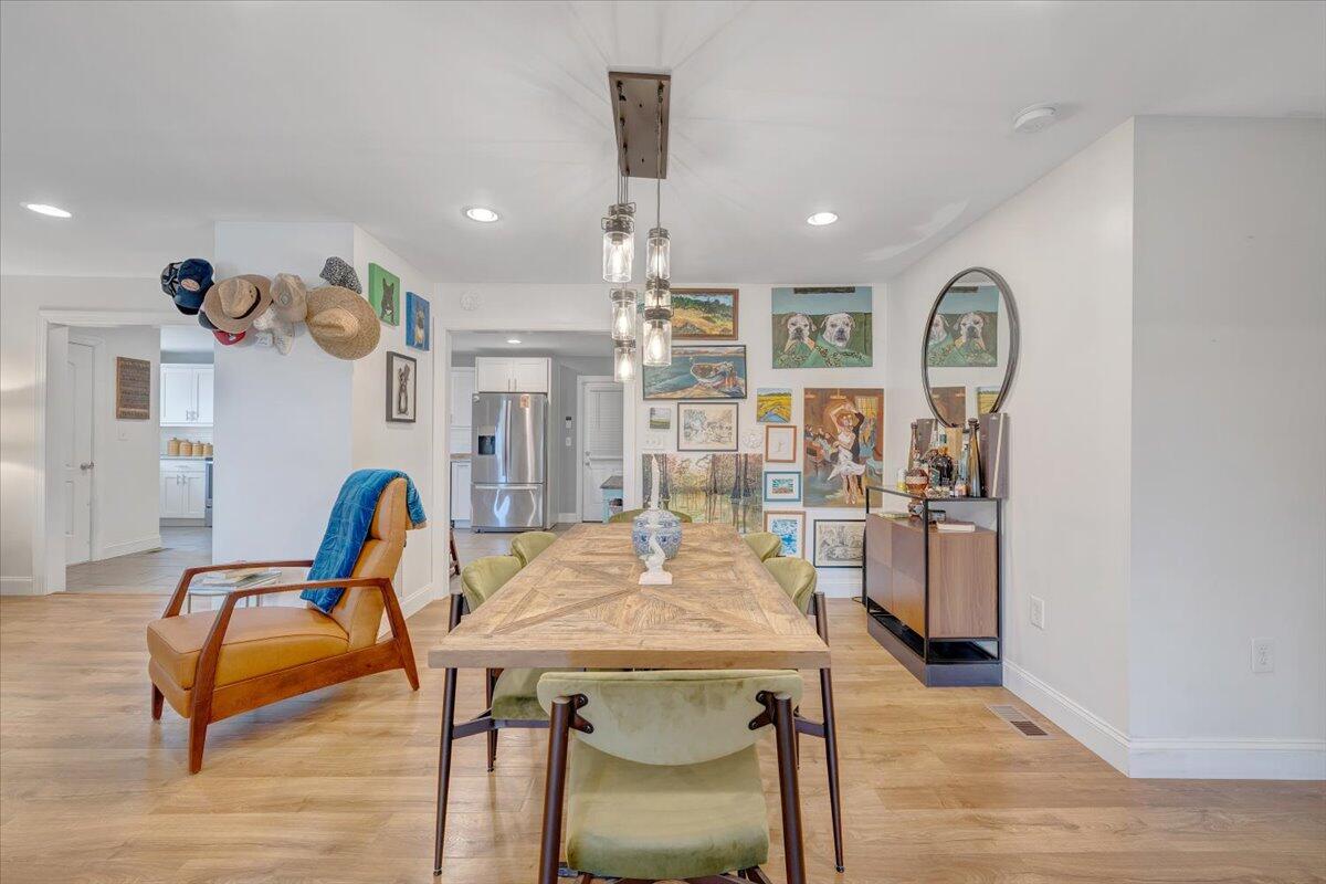 4515 Yellow Mountain Road Roanoke, VA 24014 - Photo 7 of 52 a view of a dining room with furniture and a chandelier