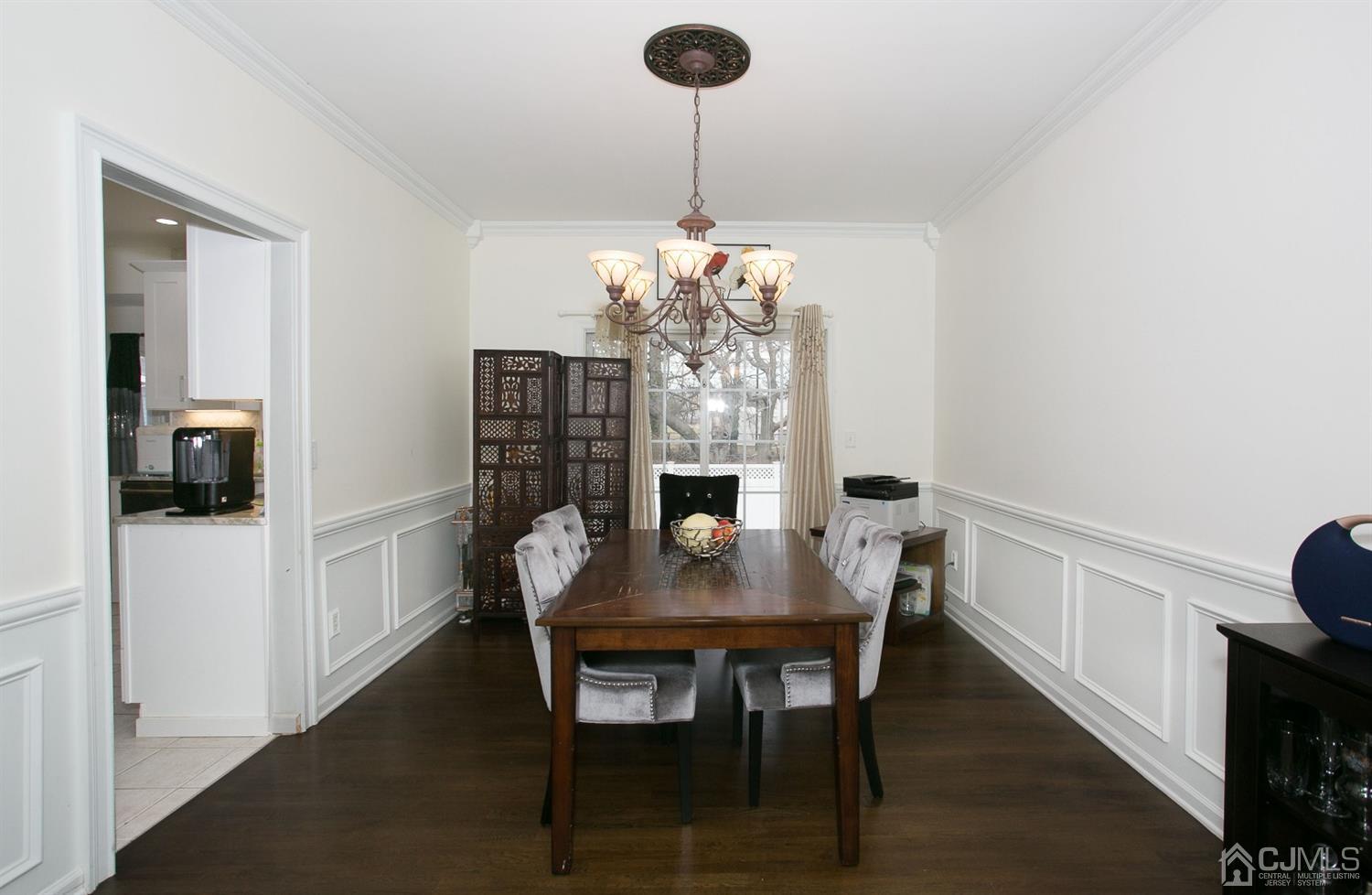 12 Lenox Street Edison, NJ 08817 - Photo 13 of 33 a view of a dining room with furniture and wooden floor