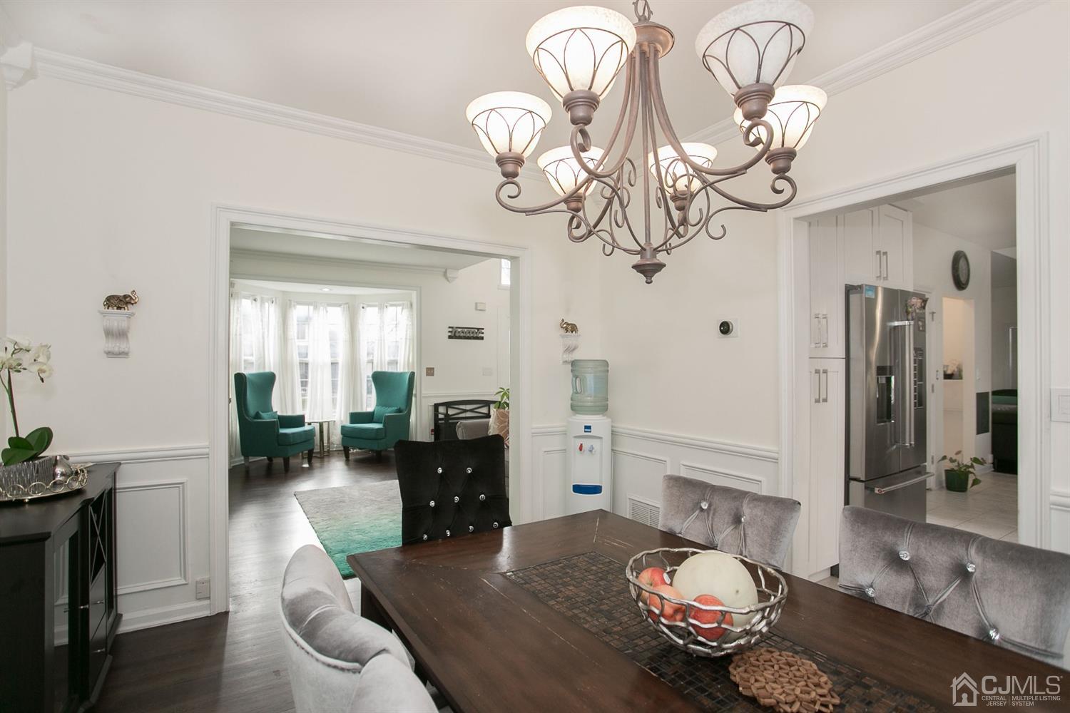 12 Lenox Street Edison, NJ 08817 - Photo 14 of 33 a view of a livingroom with furniture a chandelier