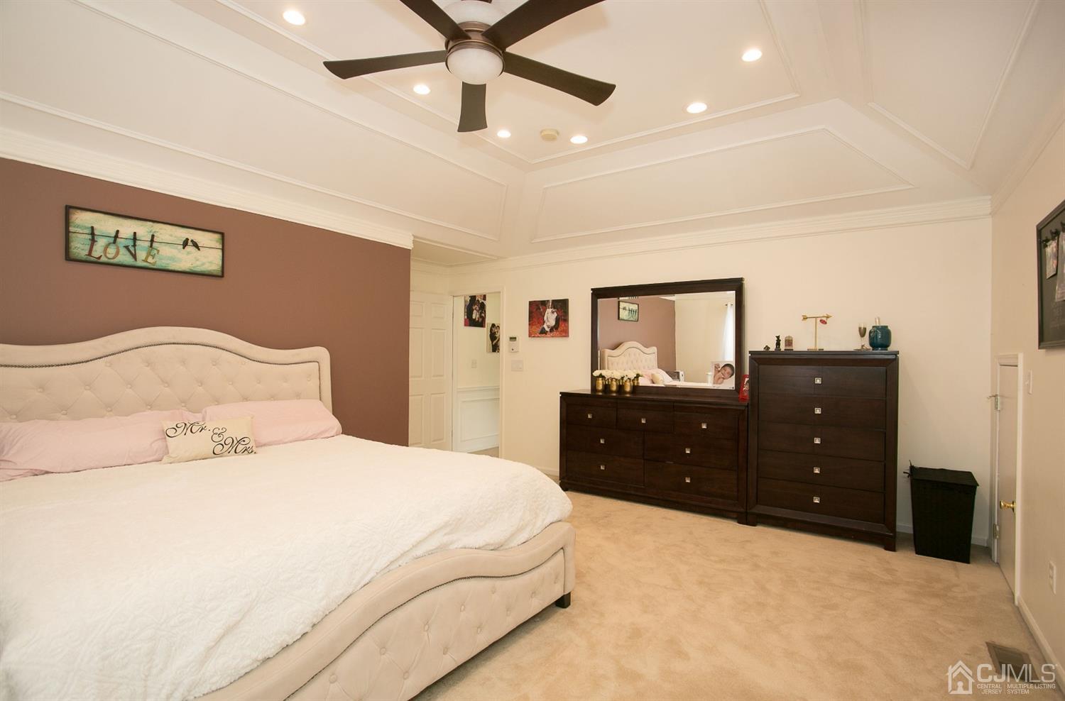 12 Lenox Street Edison, NJ 08817 - Photo 26 of 33 a bedroom with a bed and a dresser