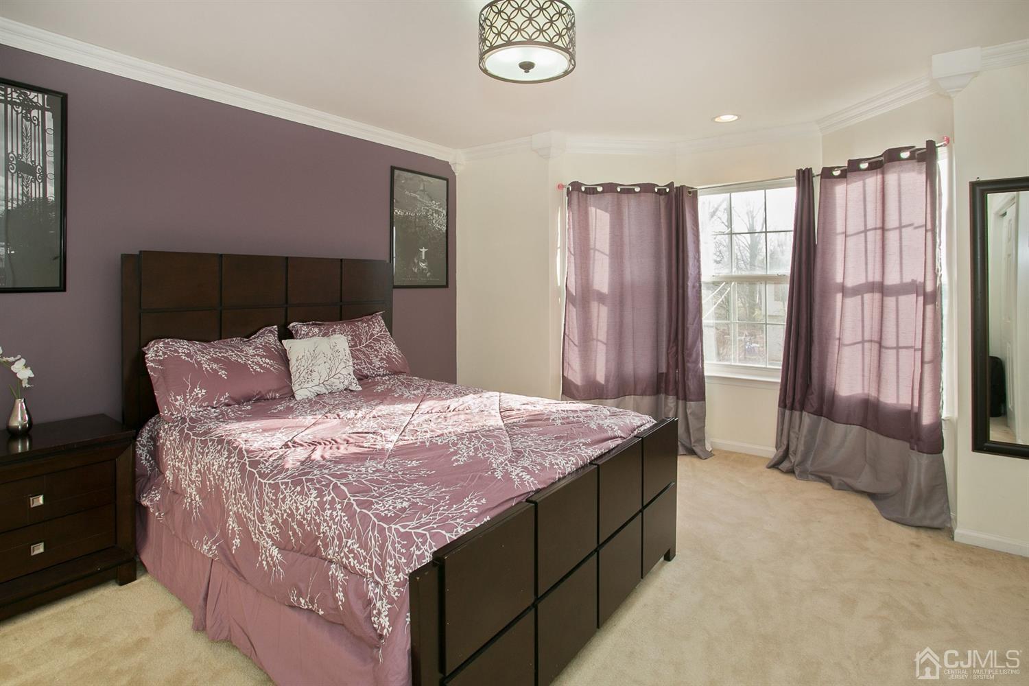 12 Lenox Street Edison, NJ 08817 - Photo 31 of 33 a spacious bedroom with a bed and a window
