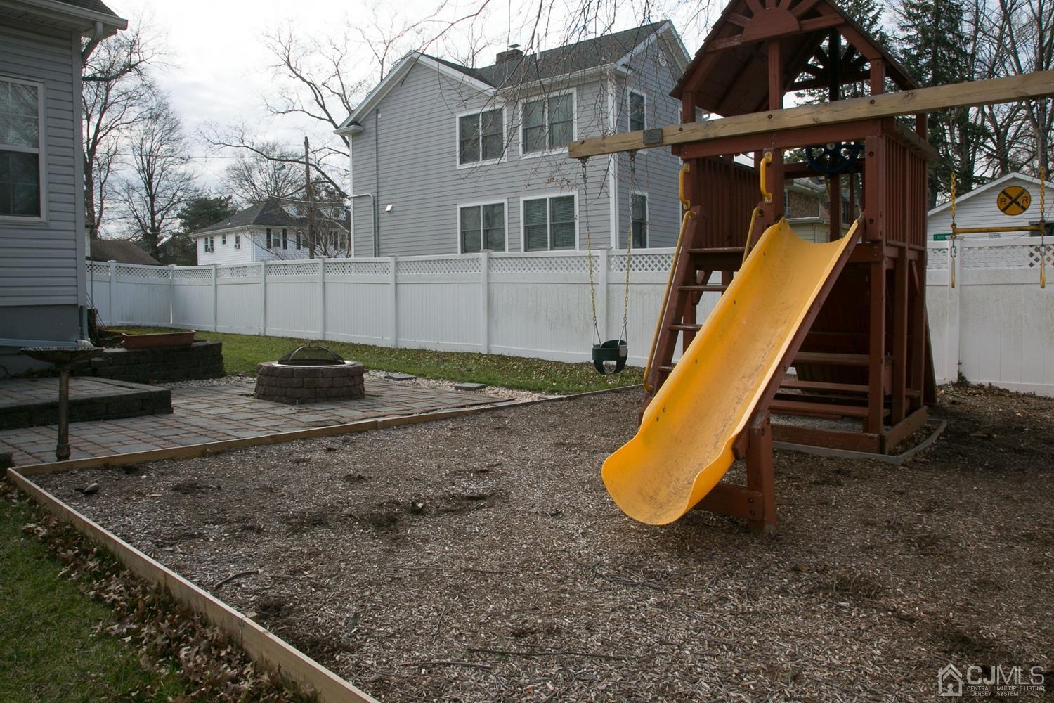 12 Lenox Street Edison, NJ 08817 - Photo 6 of 33 a view of a backyard with a small deck