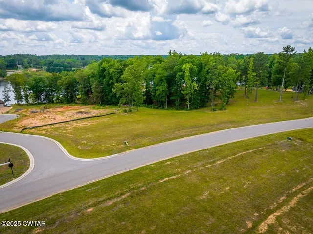 a view of an outdoor space and swimming pool