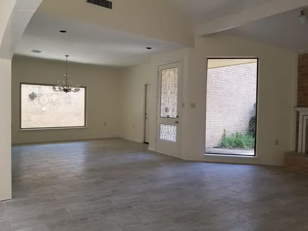 an empty room with windows