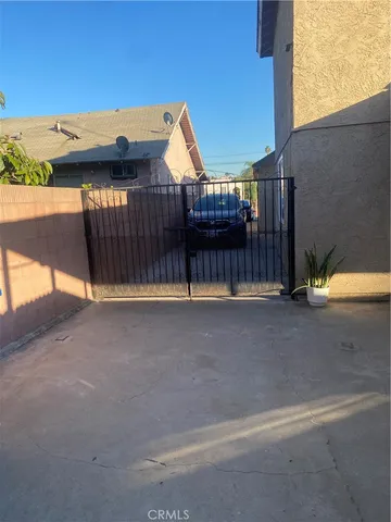 a view of a house with a street
