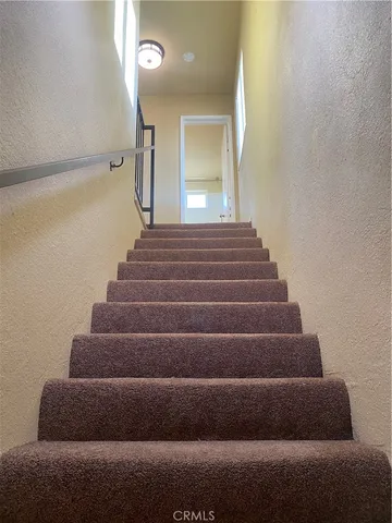 a view of entryway with a front door