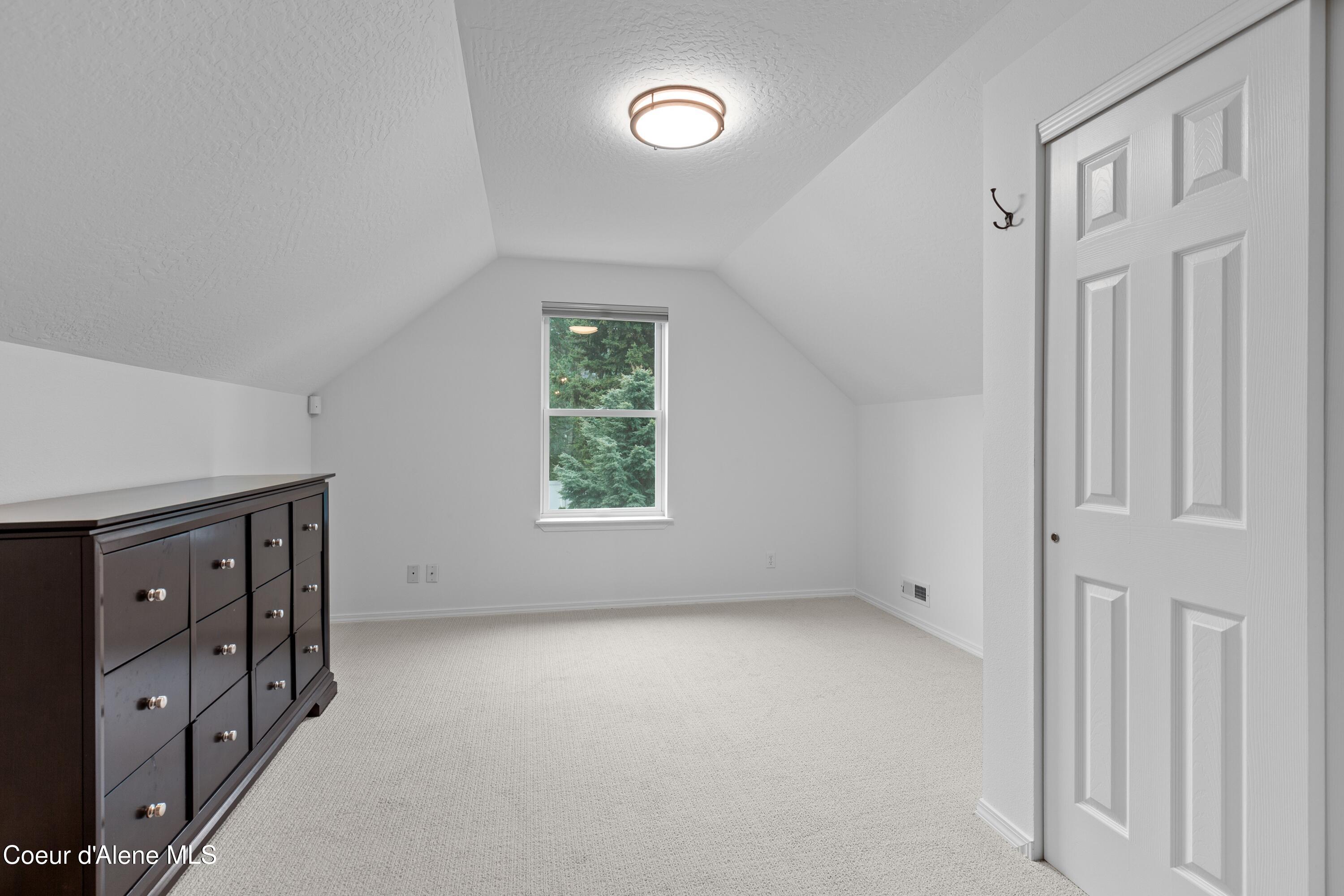 5519 North Wade Street Coeur D'Alene, ID 83815 - Photo 29 of 57 Upper Level Guest Bedroom
