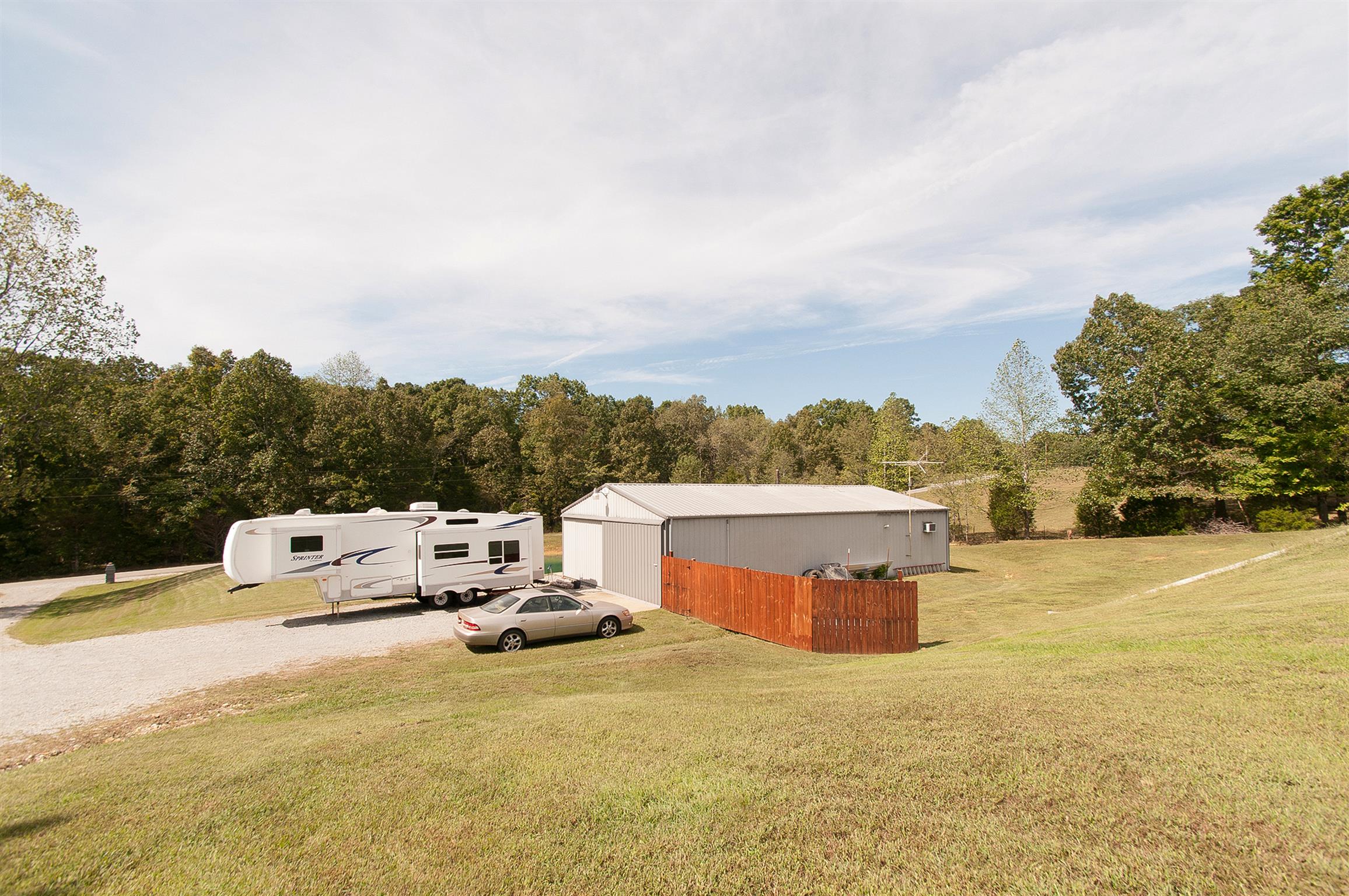 1830 Fortner Road Dickson, TN 37055 - Photo 20 of 23 Work shop/garage building Storm shelter beside storage building