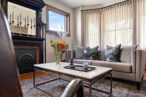 a living room with a couch and a table