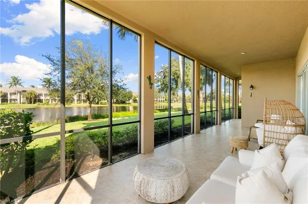 a view of balcony with a yard