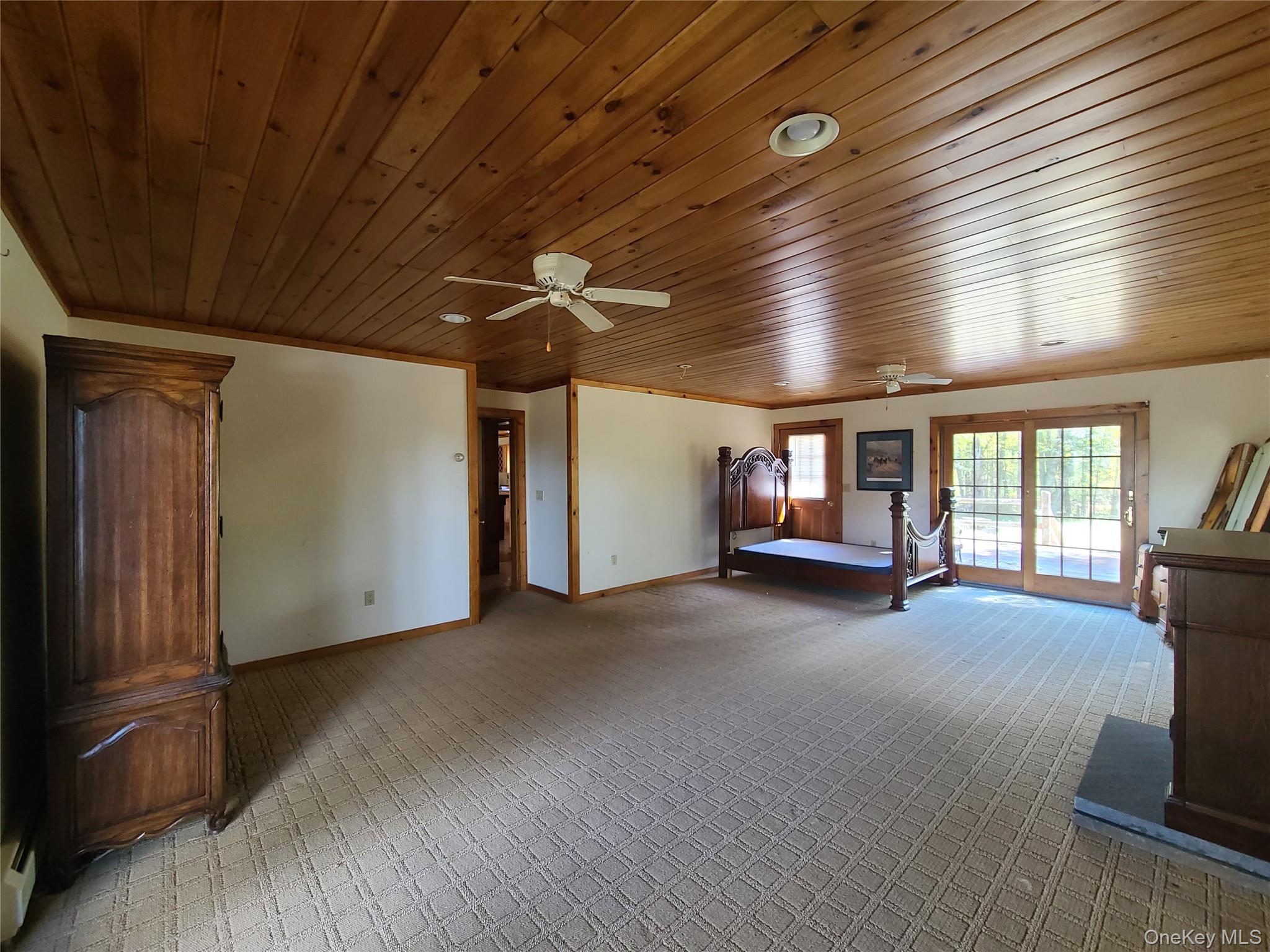 118 Hilltop Road Monticello, NY 12701 - Photo 13 of 45 a view of a livingroom with fireplace and window