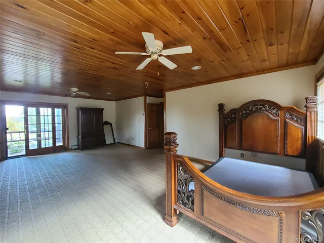 a view of outdoor space with wooden floor and outdoor seating