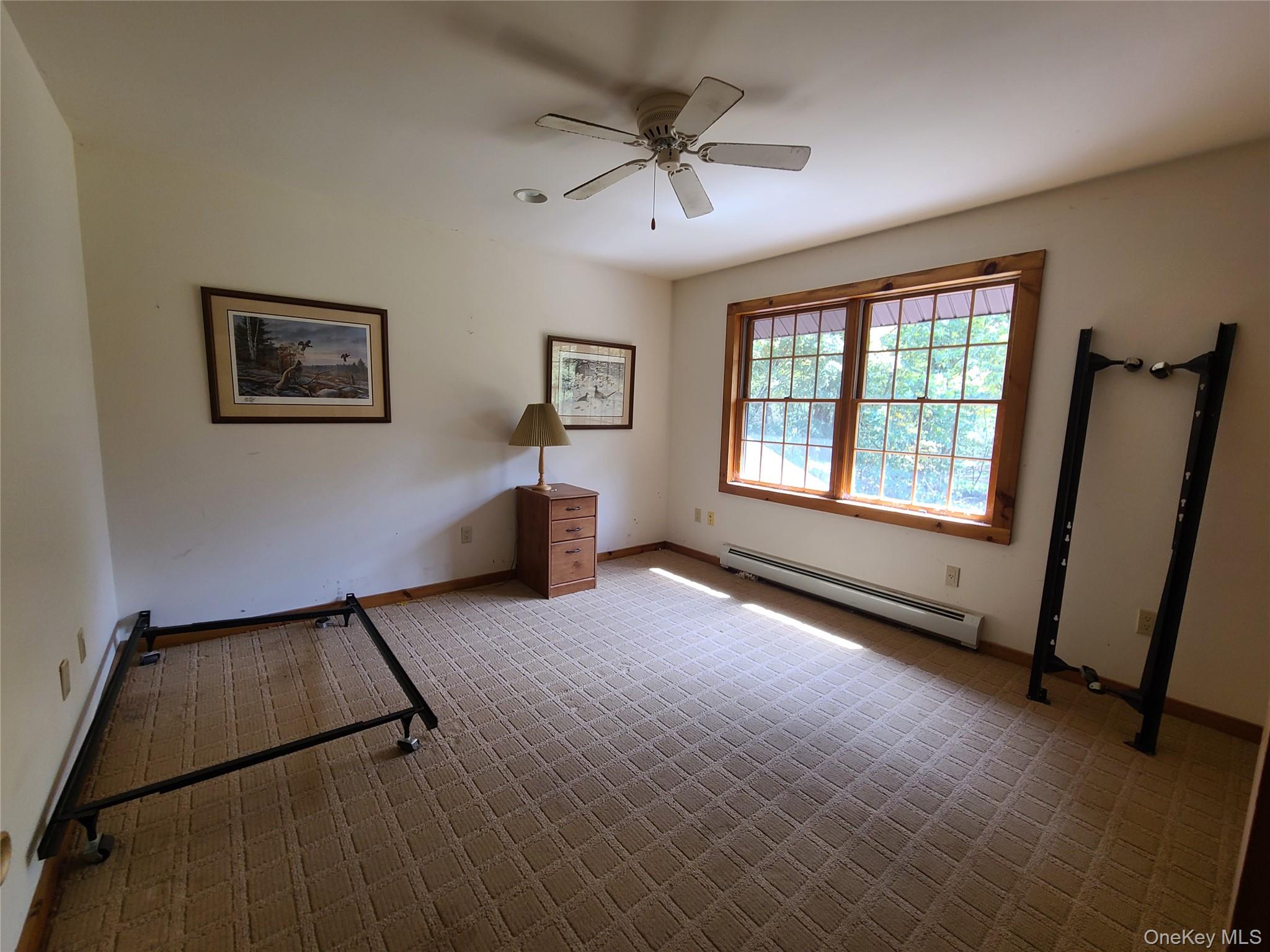 118 Hilltop Road Monticello, NY 12701 - Photo 17 of 45 a view of an empty room with a window