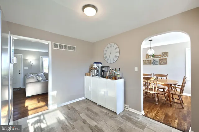 a view of a dining room and wooden floor