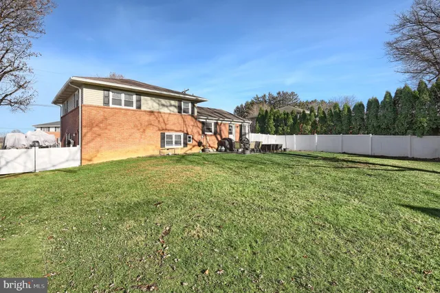 an outdoor sitting area with golf course
