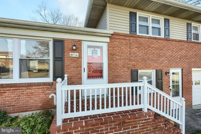 a view of a brick house with a window