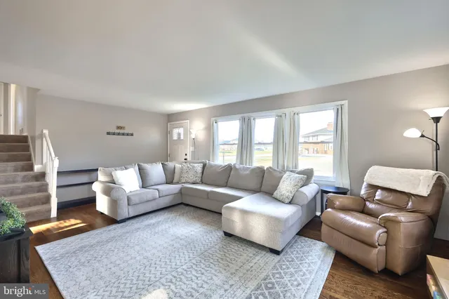 a living room with furniture and a couch