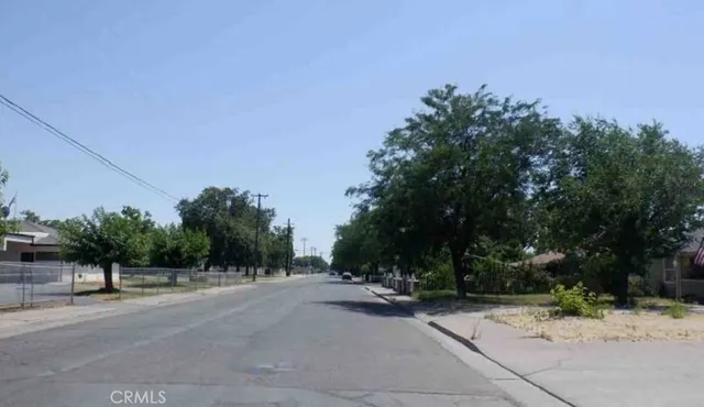 a view of a street with a trees