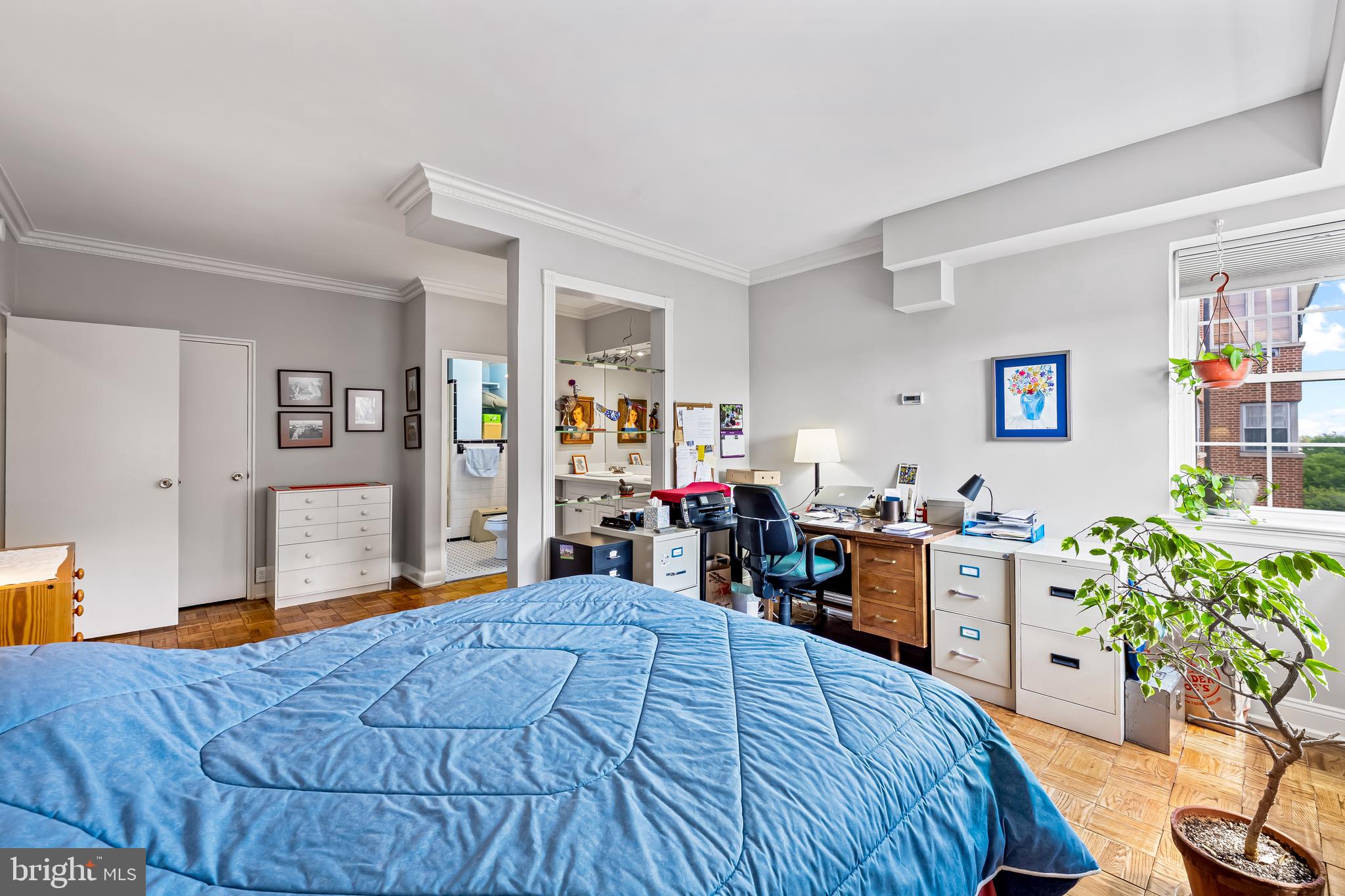 3601 Greenway, Unit 705 Baltimore, MD 21218 - Photo 20 of 30 a bedroom with bed and wooden floor