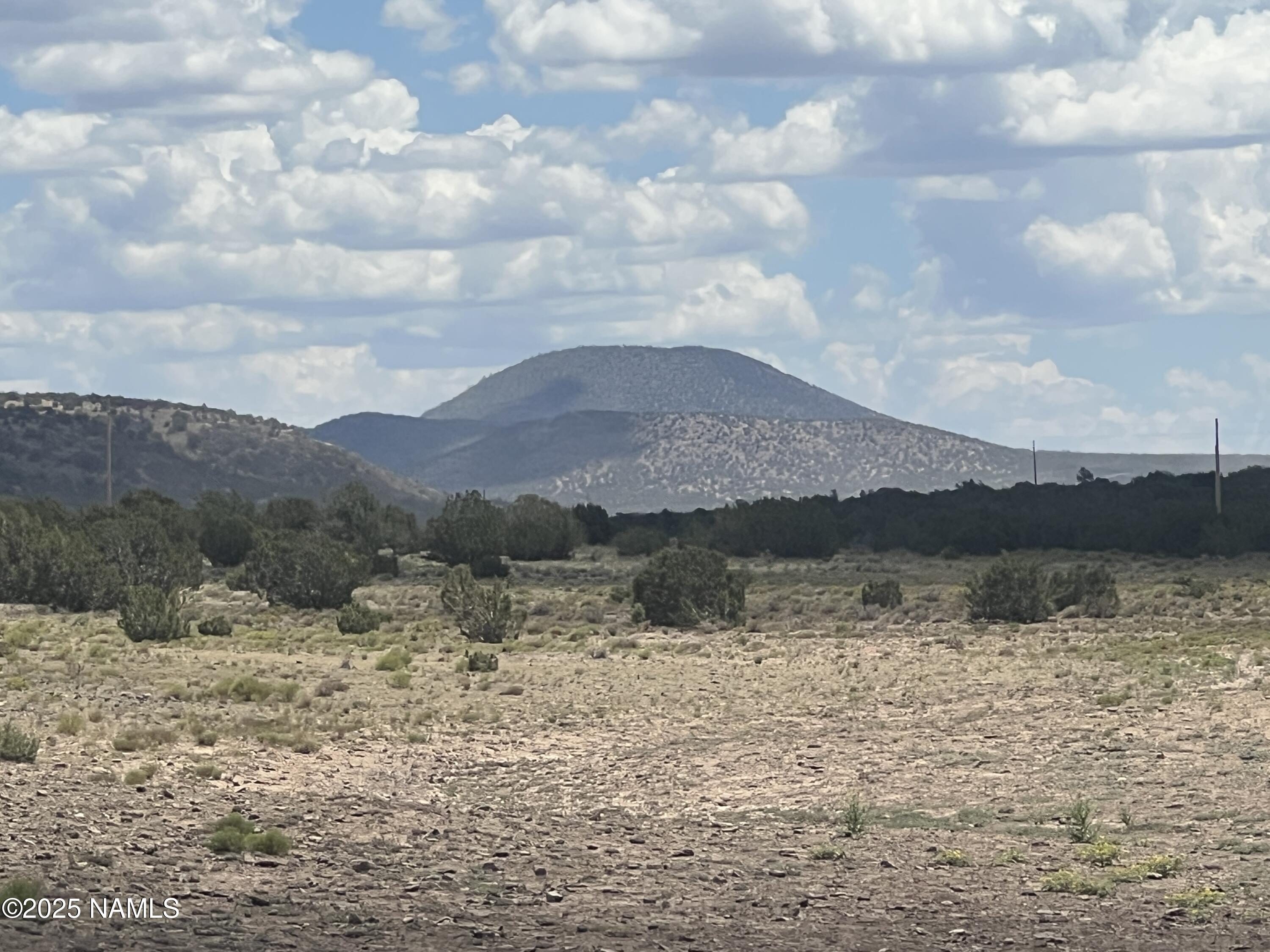 3472 Whitetail Loop Williams, AZ 86046 - Photo 2 of 23 a view of lake with mountain