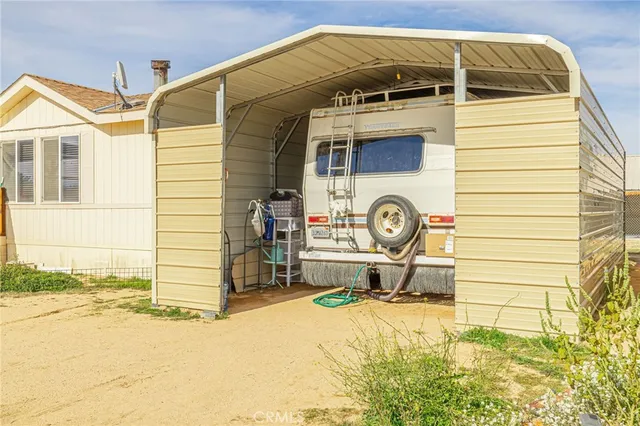 a living room with furniture window and wooden floor