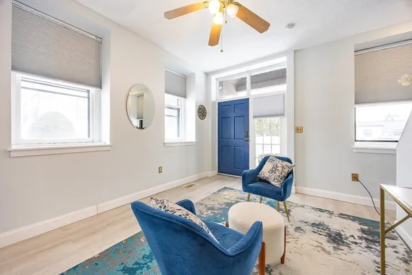 a living room with furniture and a window