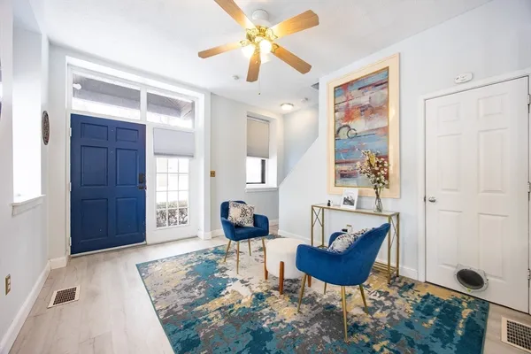 a living room with furniture and a window