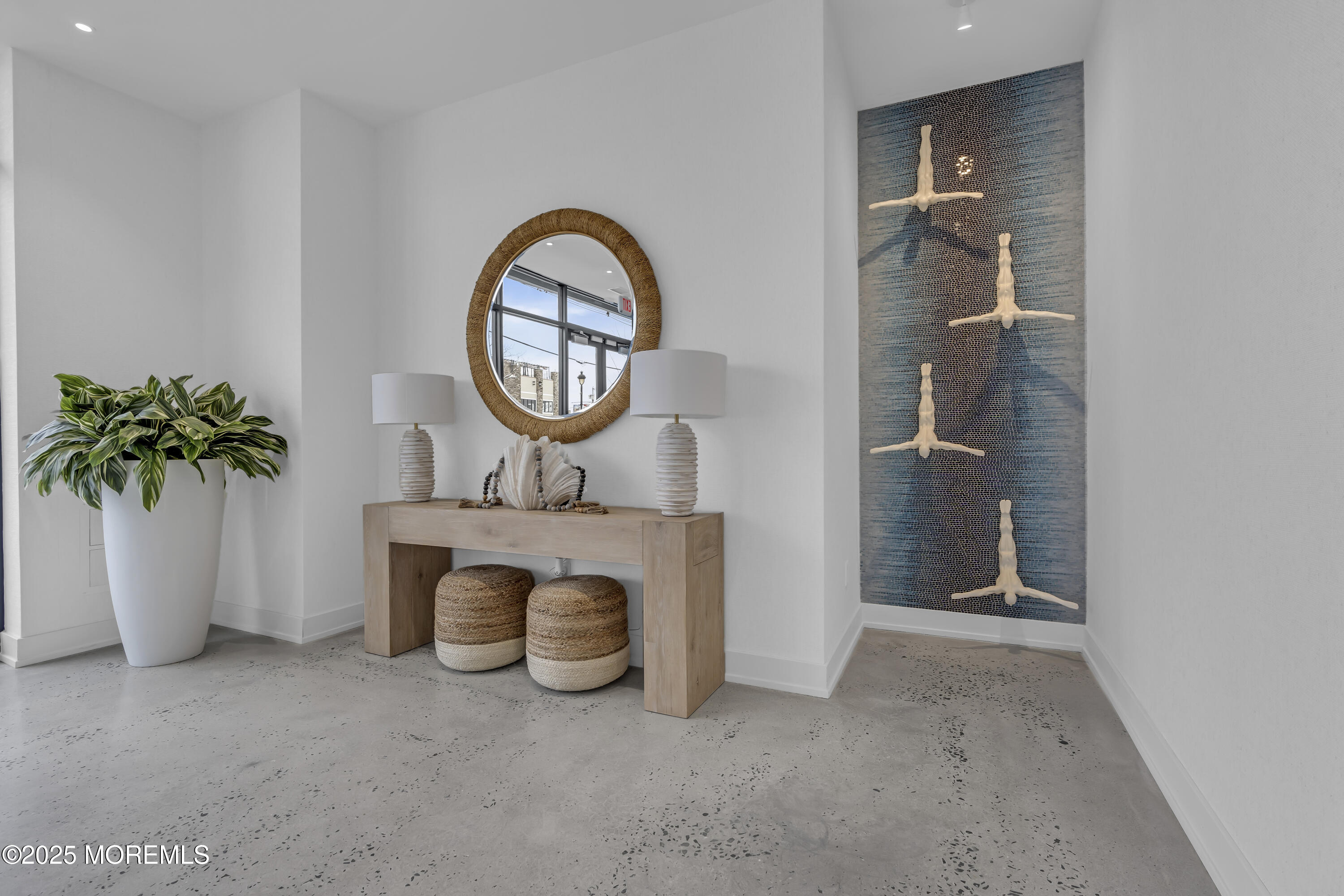 19 Carr Avenue, Unit 414 Keansburg, NJ 07734 - Photo 2 of 83 a living room with furniture a potted plant and a fireplace