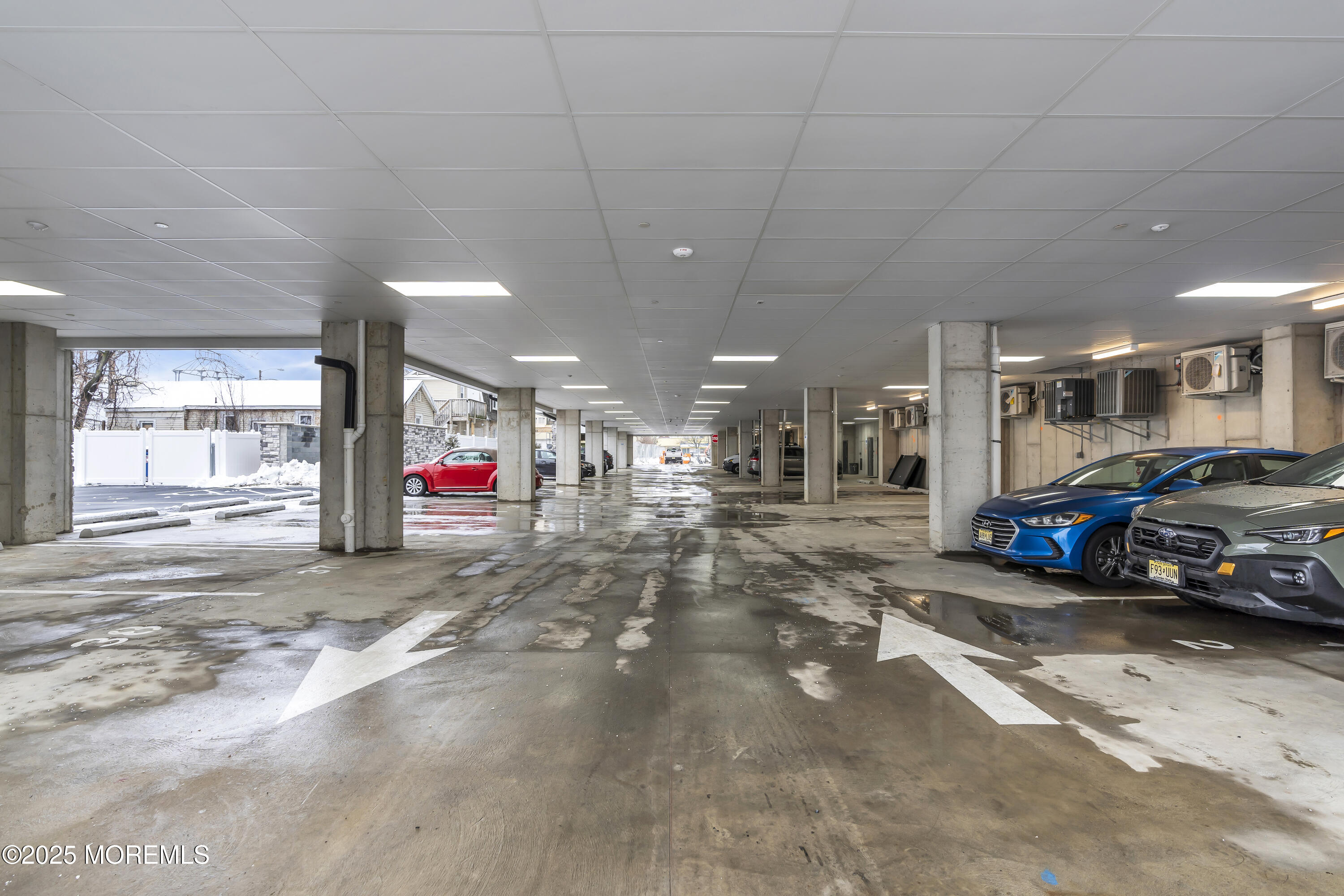 19 Carr Avenue, Unit 414 Keansburg, NJ 07734 - Photo 25 of 83 a view of a cars park in front of a building