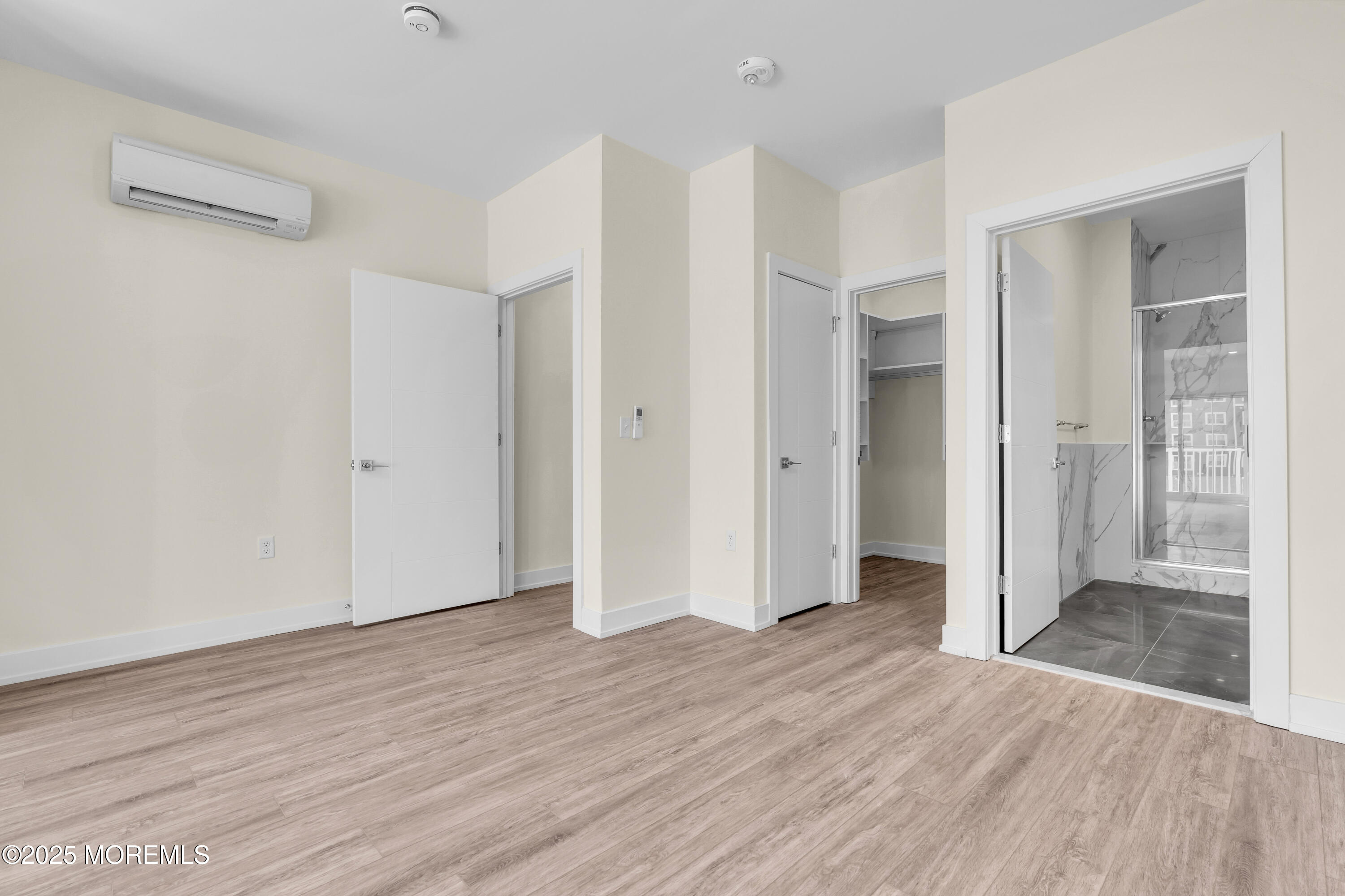 19 Carr Avenue, Unit 414 Keansburg, NJ 07734 - Photo 78 of 83 a view of an empty room and wooden floor