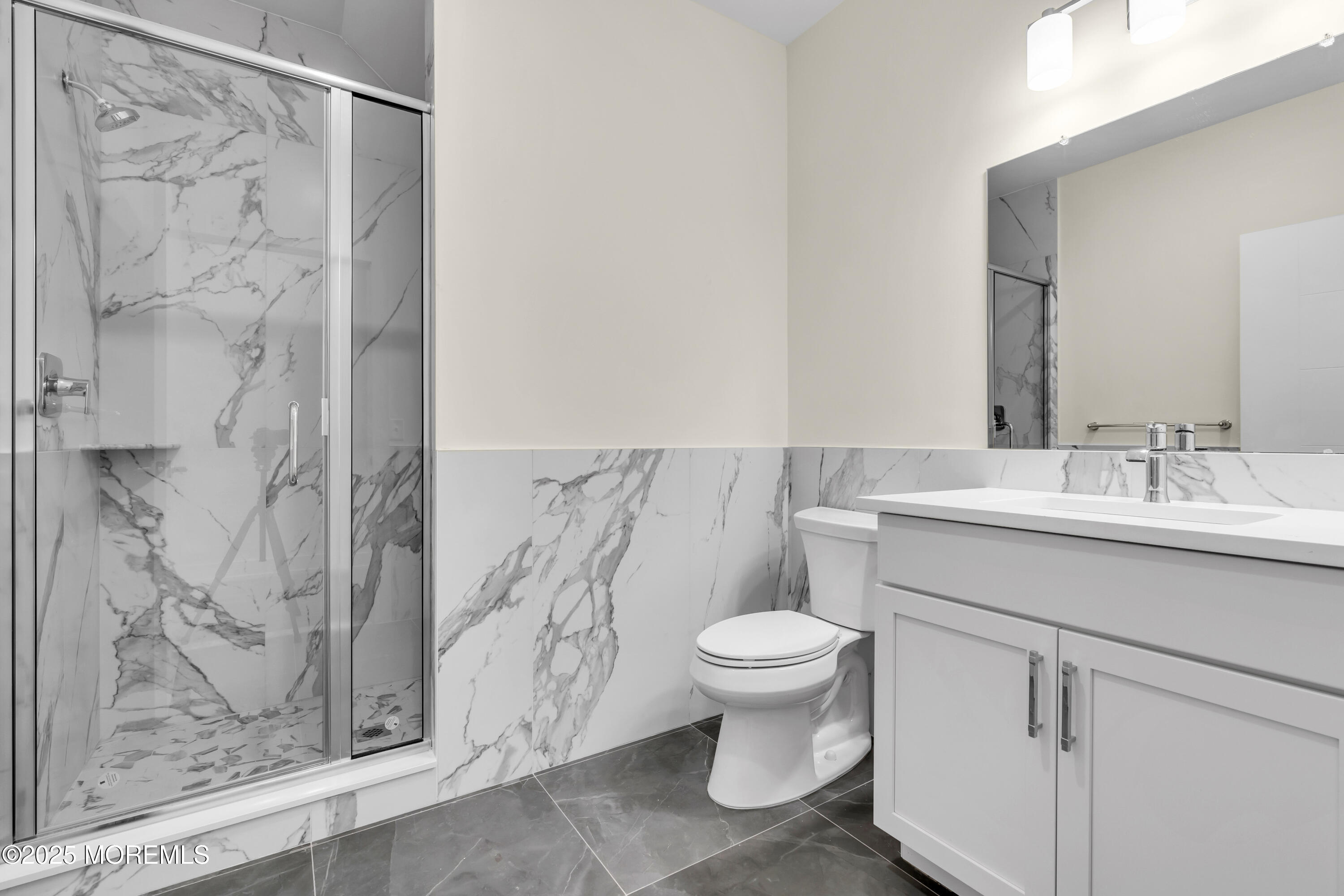 19 Carr Avenue, Unit 414 Keansburg, NJ 07734 - Photo 82 of 83 a bathroom with a sink toilet and shower