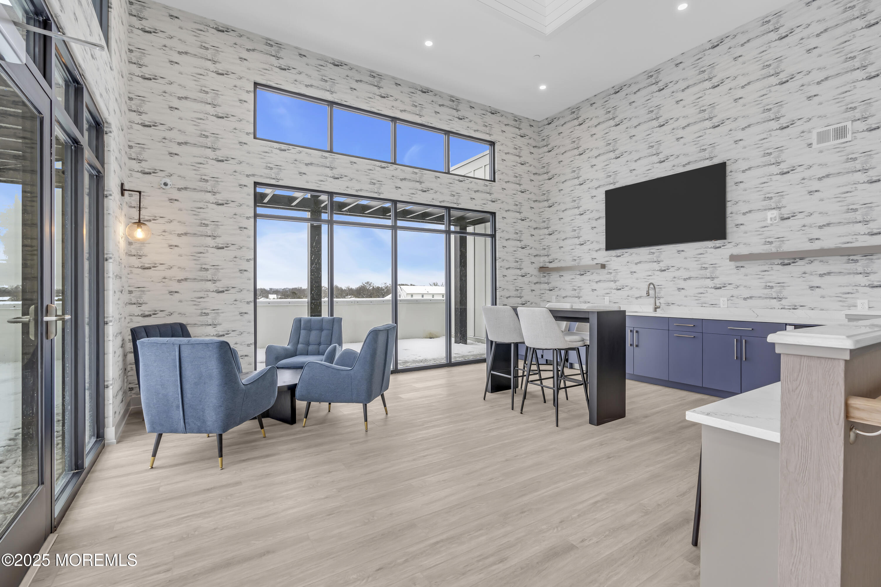 19 Carr Avenue, Unit 414 Keansburg, NJ 07734 - Photo 10 of 83 a living room with furniture wooden floor and a flat screen tv
