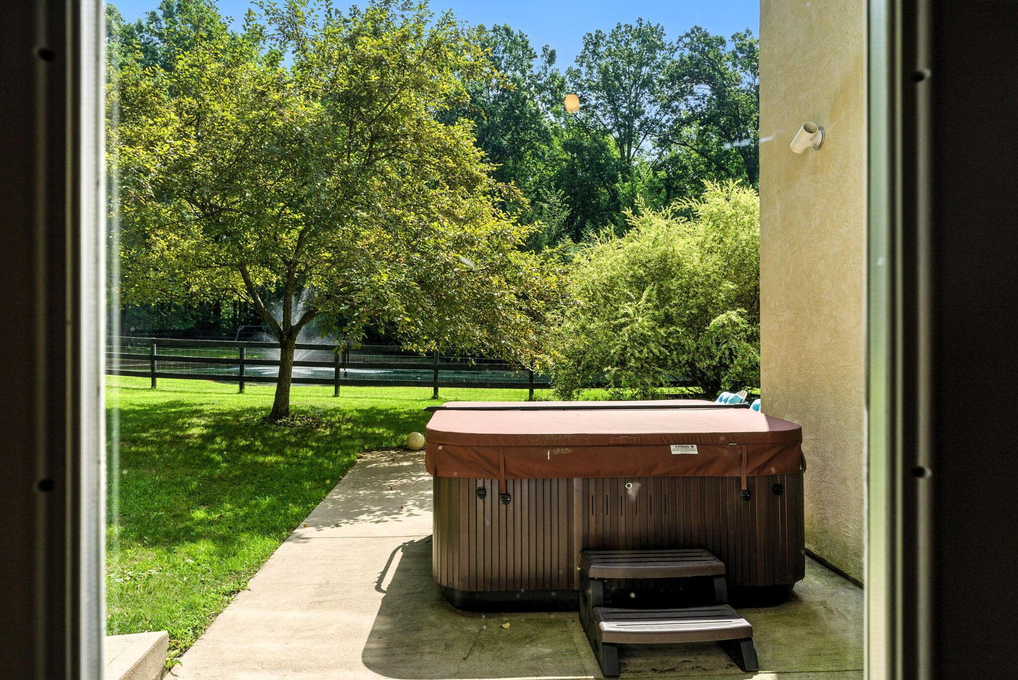 8174 Windy Hollow Road Johnstown, OH 43031 - Photo 54 of 76 Patio and Hot Tub located off the Lower Level Walk-Out.