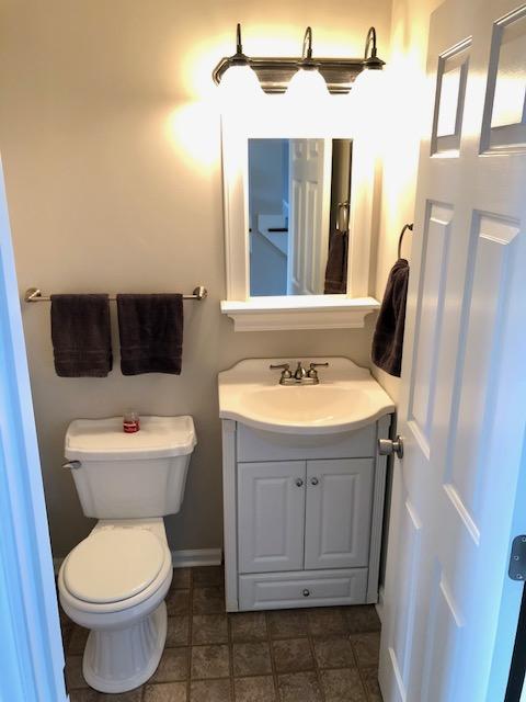308 North Preston Road Vinton, VA 24179 - Photo 11 of 29 a bathroom with a toilet sink and mirror