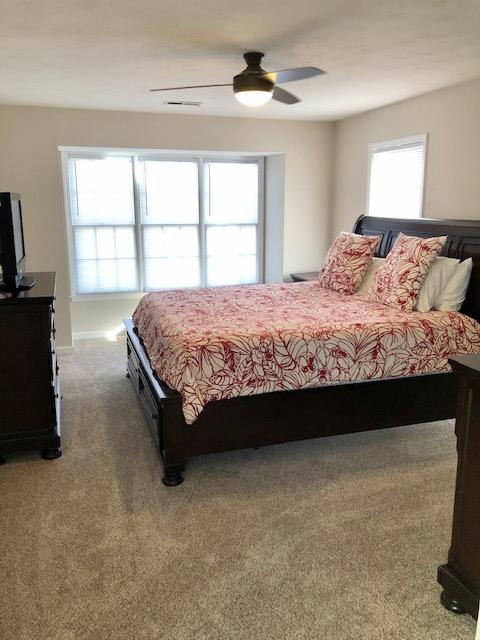 308 North Preston Road Vinton, VA 24179 - Photo 13 of 29 a spacious bedroom with a bed and a flat tv screen