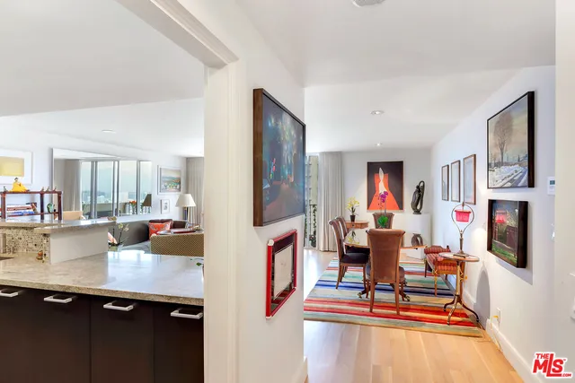 a living room with fireplace furniture and a flat screen tv
