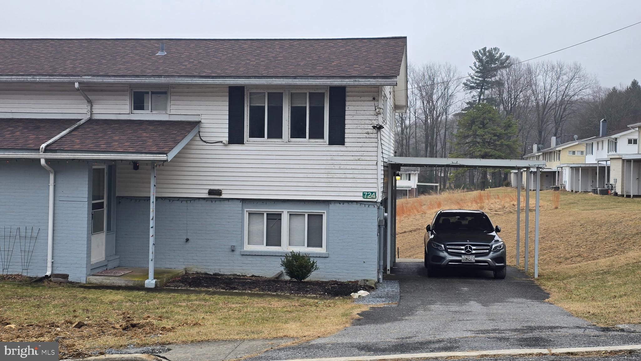 a front view of a house with a garage