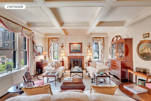a picture of a room with a white wall and white umbrellas