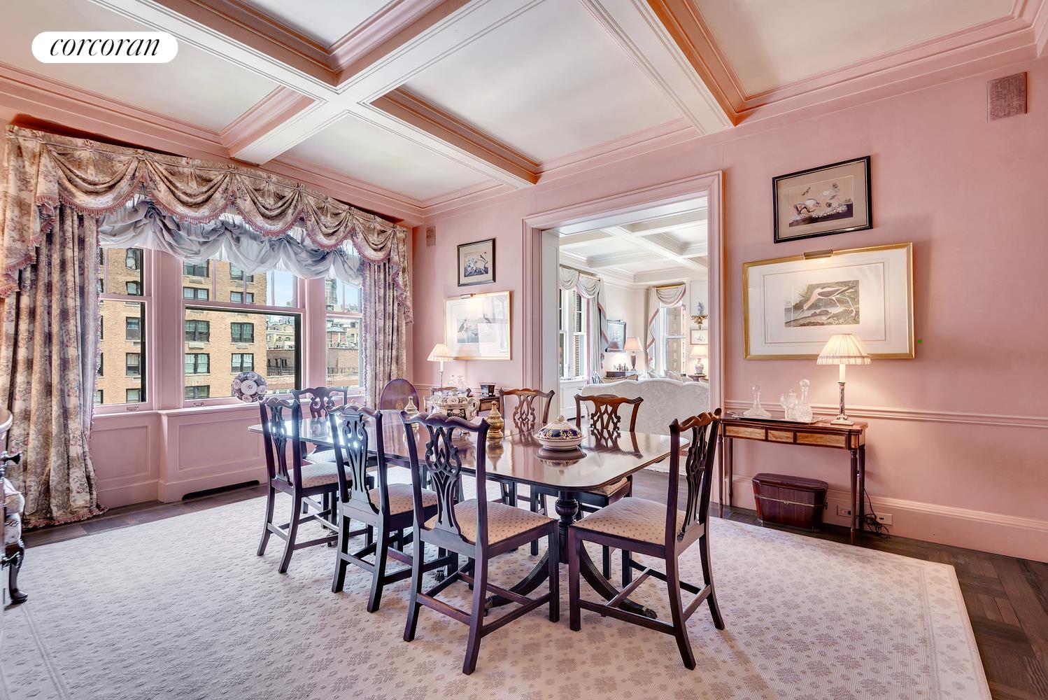 555 Park Avenue, Unit 9E Manhattan, NY 10065 - Photo 3 of 11 a view of a dining room with furniture window and wooden floor