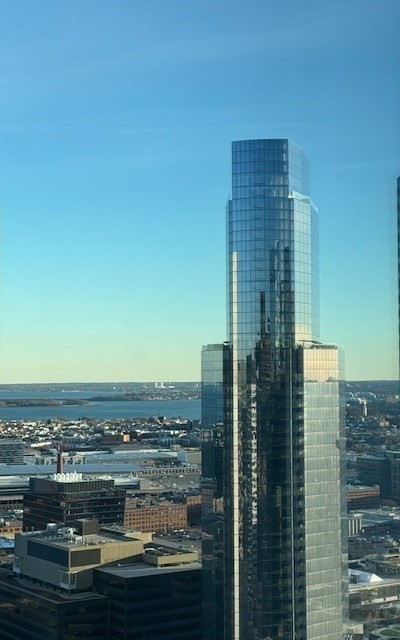240 Devonshire Street, Unit 4011 Boston, MA 02110 - Photo 14 of 21 a view of a city with tall buildings