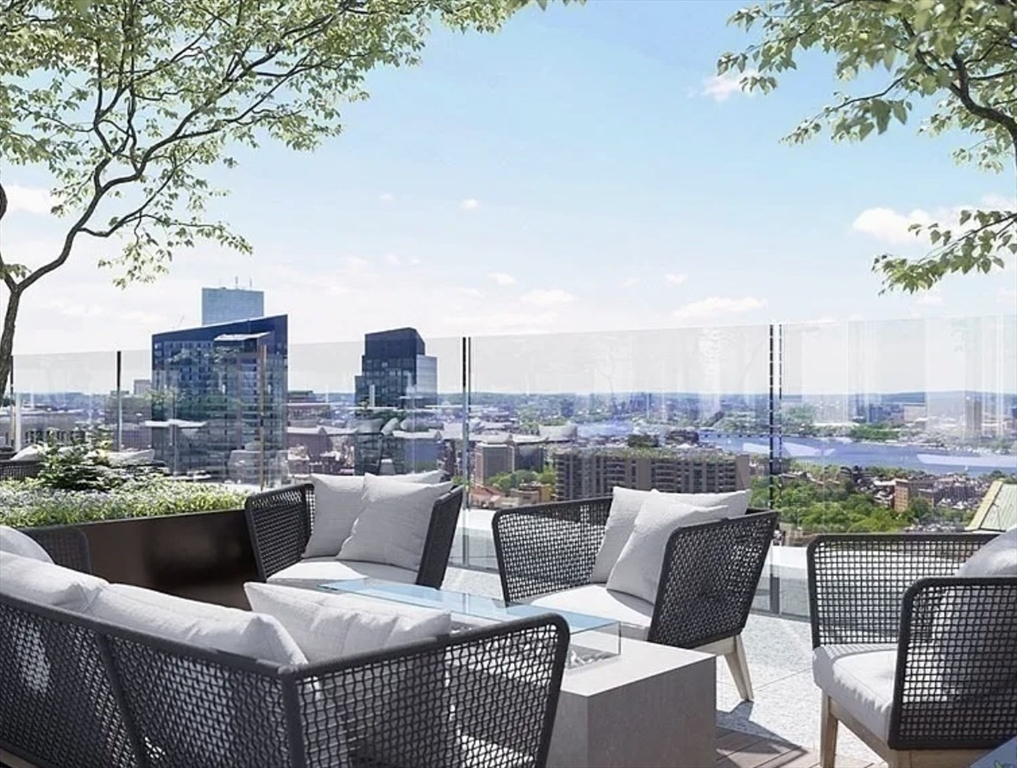 240 Devonshire Street, Unit 4011 Boston, MA 02110 - Photo 20 of 21 a view of a terrace with furniture