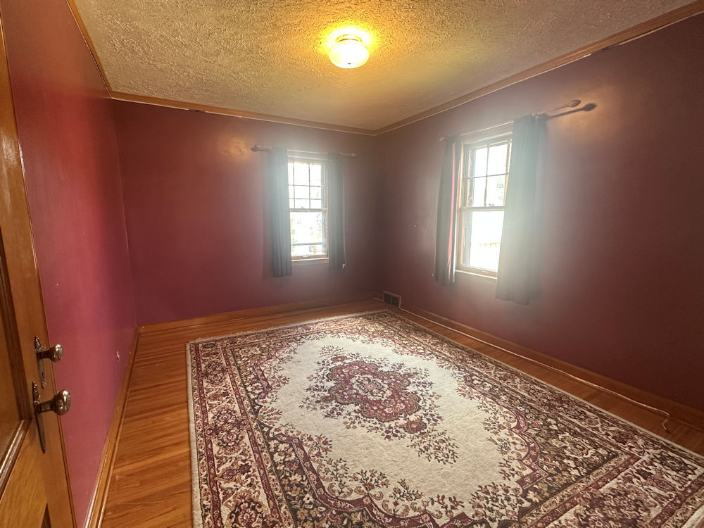 516 North 6th Street Rochelle, IL 61068 - Photo 8 of 15 a view of an empty room and window