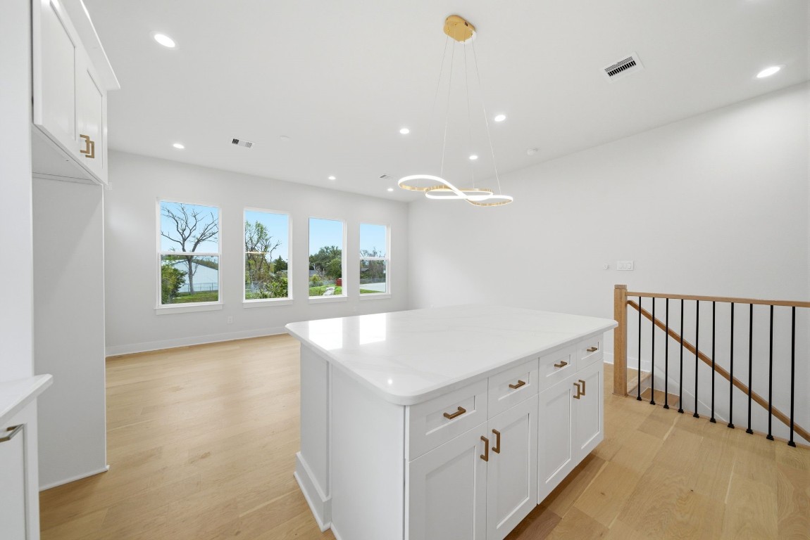 328 Janisch Road, Unit D Houston, TX 77018 - Photo 16 of 37 wooden floor in an empty room with a window