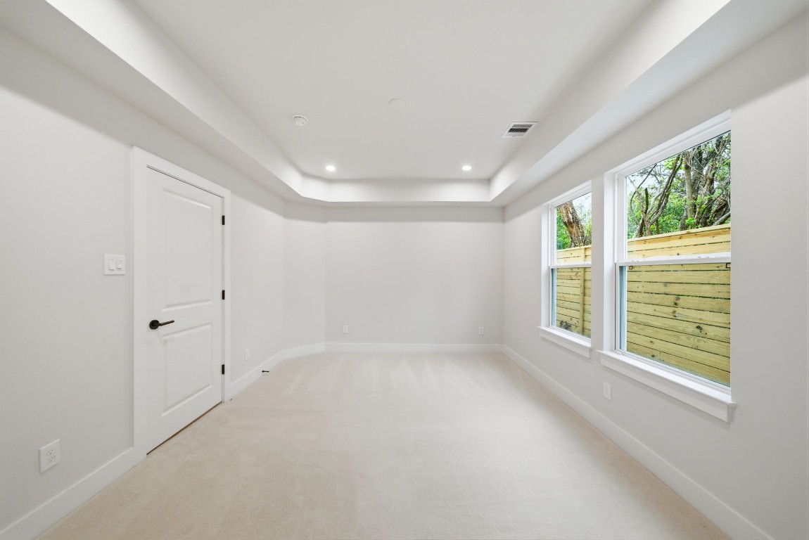 328 Janisch Road, Unit D Houston, TX 77018 - Photo 6 of 37 a view of an empty room with a window
